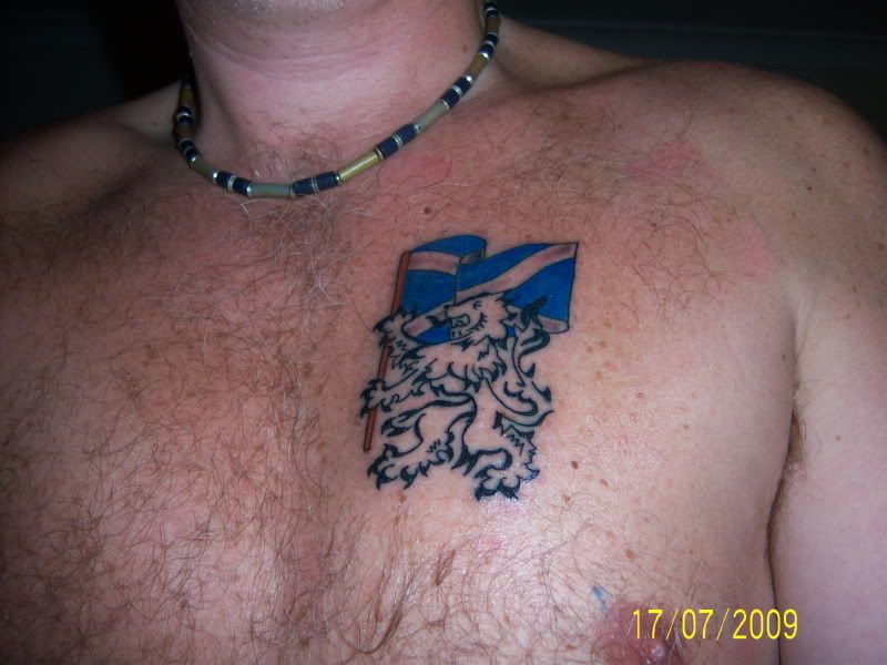 100_1793.jpg Lion Rampant Holding St Andrews Cross