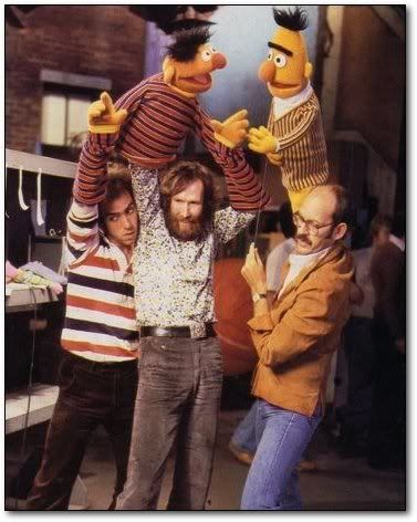 Bert and Ernie Sesame Street with the actors puppeteers showing guy in his armpit